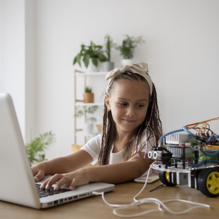 adorable-girl-being-passionate-about-robotics